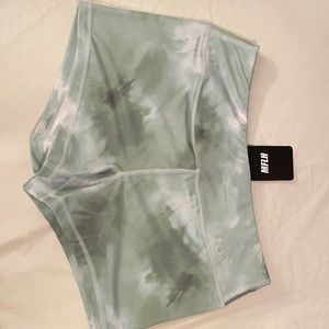 Move fast lift heavy booty shorts in Mint tie dye. Super cute and cheeky.